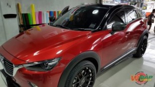 Wrap เปลี่ยนสีรถ Mazda CX3 ดำเงาครึ่งคันบน