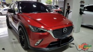 Wrap เปลี่ยนสีรถ Mazda CX3 ดำเงาครึ่งคันบน (1)