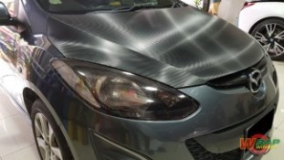 หุ้มฟิล์มไฟหน้า Mazda2 สีสโมคอ่อน (1)