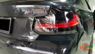 หุ้มฟิล์มไฟหน้า BMW สีสโมคเข้ม (2)